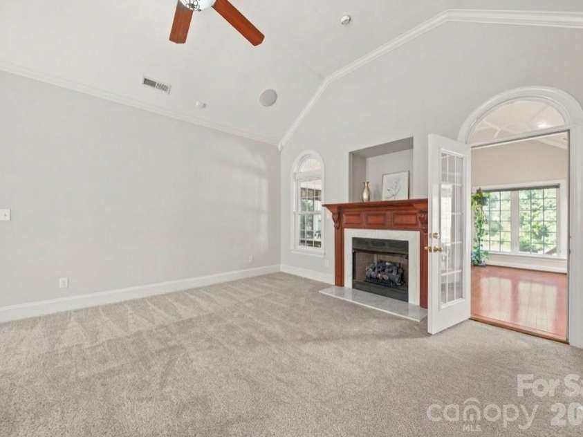 5106 Pond Bluff Drive, Monroe, NC 28112.  MLS# CAR4358314, YatesRealty ID 14505. Living room featuring propane fireplace