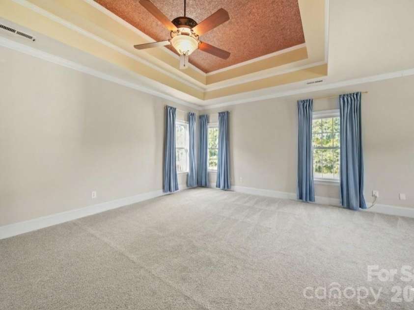 5106 Pond Bluff Drive, Monroe, NC 28112.  MLS# CAR4358314, YatesRealty ID 14505. Primary bedroom