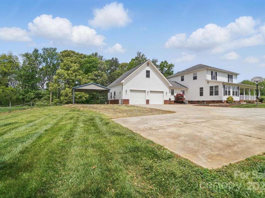 725 Bradshaw Road, Mt Ulla, NC 28125.  MLS# CAR4249662, YatesRealty ID 14505. 