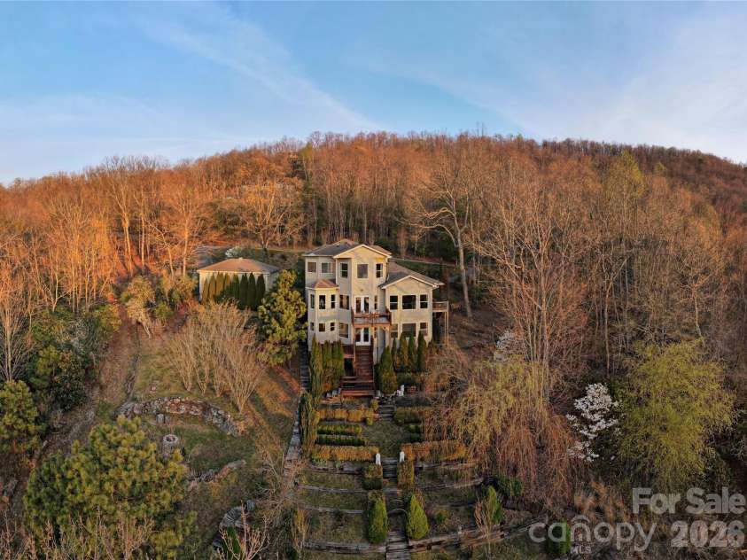 301 Forge Crest Drive, Mills River, NC 28759.  MLS# CAR4369584, YatesRealty ID 14515. 4+ acres of privacy