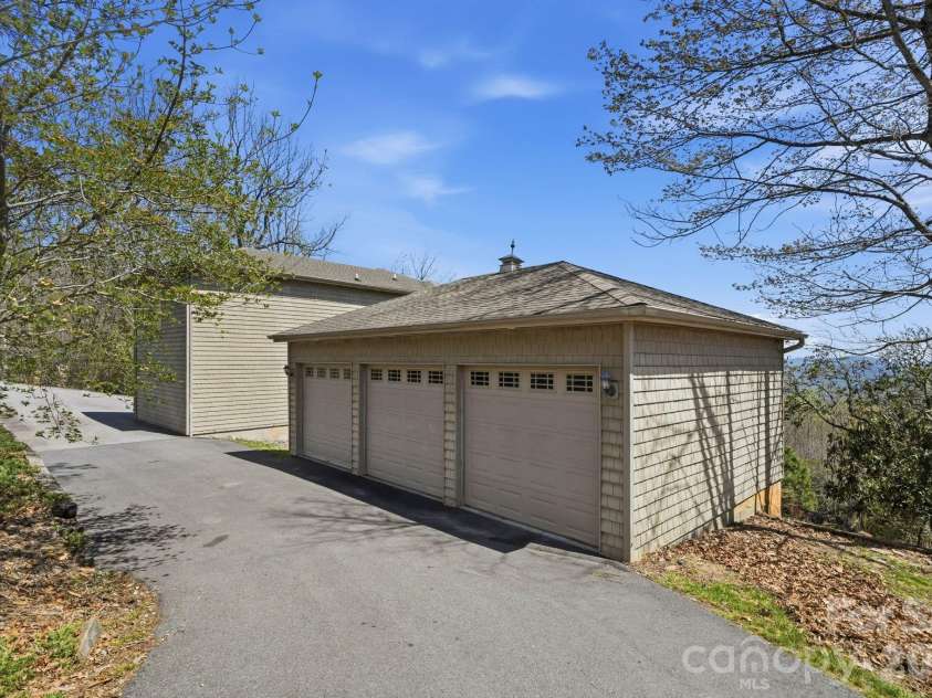 301 Forge Crest Drive, Mills River, NC 28759.  MLS# CAR4369584, YatesRealty ID 14515. Detached garage 