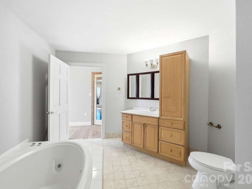 301 Forge Crest Drive, Mills River, NC 28759.  MLS# CAR4369584, YatesRealty ID 14515. Lower level bathroom