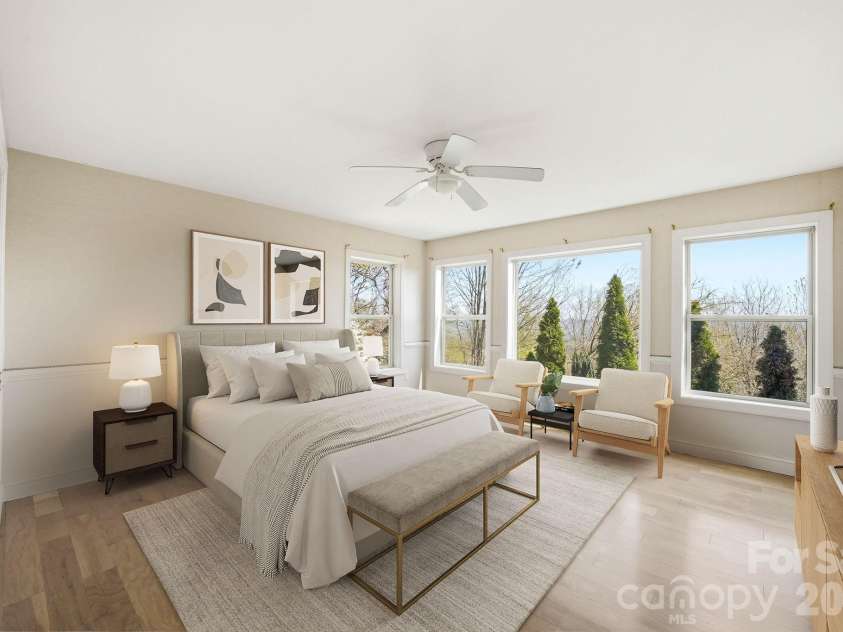 301 Forge Crest Drive, Mills River, NC 28759.  MLS# CAR4369584, YatesRealty ID 14515. Lower level bedroom with a view. Virtually Staged
