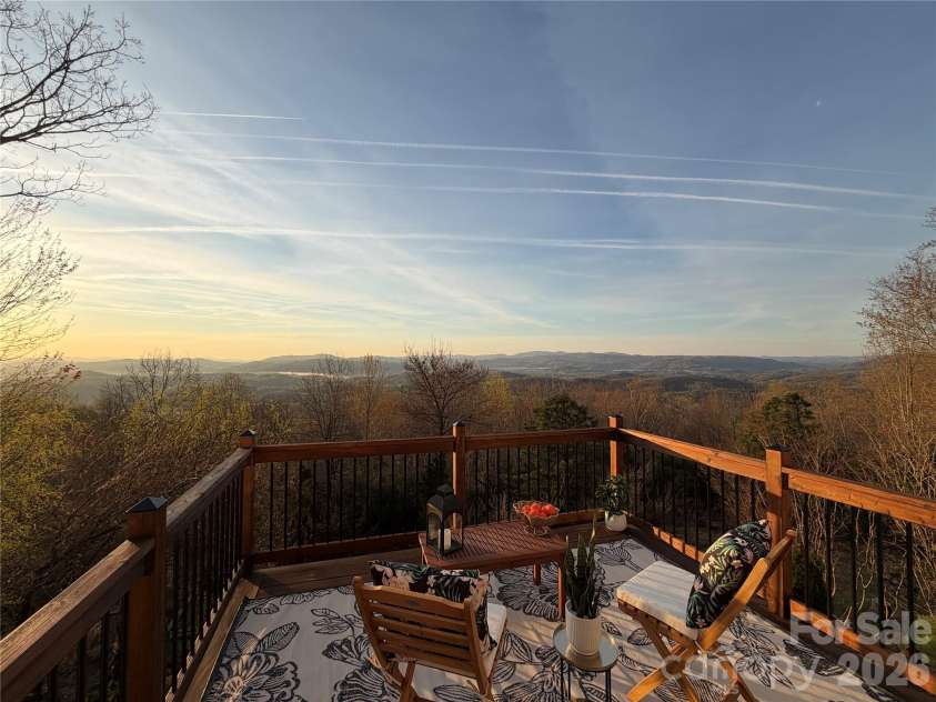 301 Forge Crest Drive, Mills River, NC 28759.  MLS# CAR4369584, YatesRealty ID 14515. Main Level Deck with a view