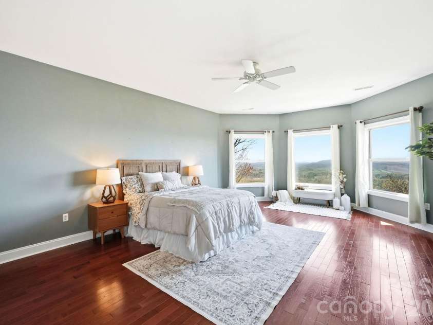 301 Forge Crest Drive, Mills River, NC 28759.  MLS# CAR4369584, YatesRealty ID 14515. Upper level Primary suite bedroom