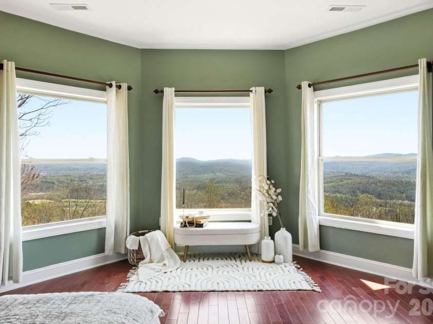 301 Forge Crest Drive, Mills River, NC 28759.  MLS# CAR4369584, YatesRealty ID 14515. Upper level Primary suite bedroom