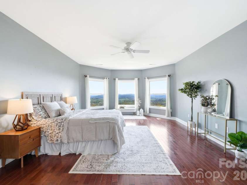 301 Forge Crest Drive, Mills River, NC 28759.  MLS# CAR4369584, YatesRealty ID 14515. Upper level Primary suite bedroom