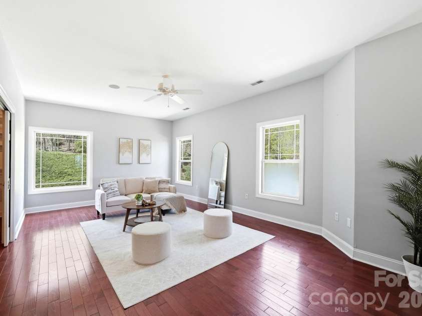 301 Forge Crest Drive, Mills River, NC 28759.  MLS# CAR4369584, YatesRealty ID 14515. Upper level Primary suite sitting area/loft