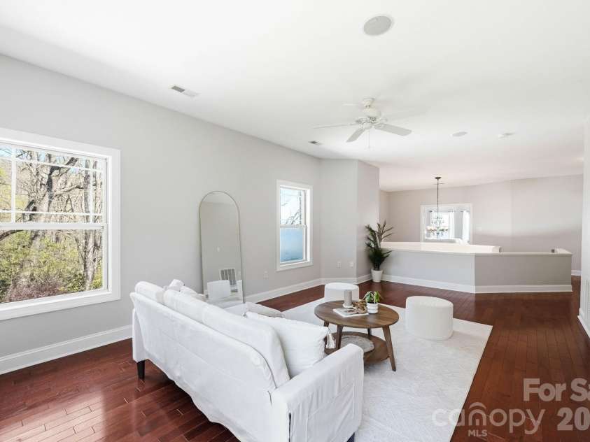 301 Forge Crest Drive, Mills River, NC 28759.  MLS# CAR4369584, YatesRealty ID 14515. Upper level Primary suite sitting area/loft