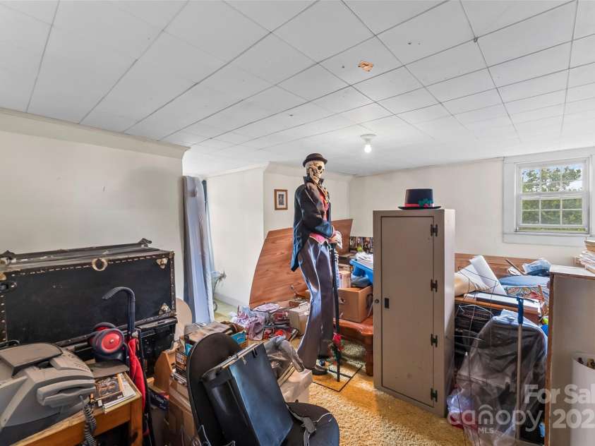 465 South Main Street, Granite Falls, NC 28630.  MLS# CAR4259409, YatesRealty ID 14515. Up stairs bedroom 1, currently used for storage