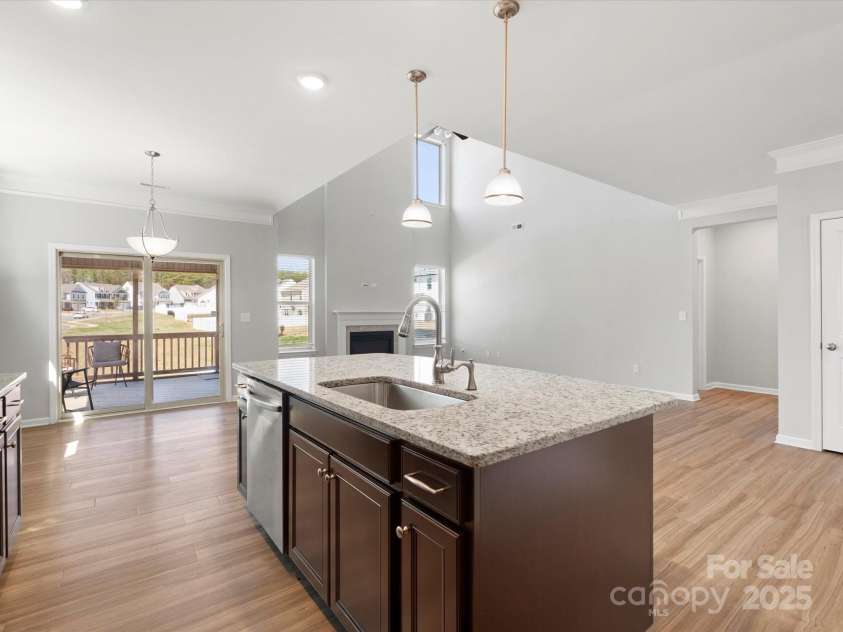 110 Lantern Acres Drive, Mooresville, NC 28115.  MLS# CAR4242068, YatesRealty ID 14516. Open view - kitchen and family room