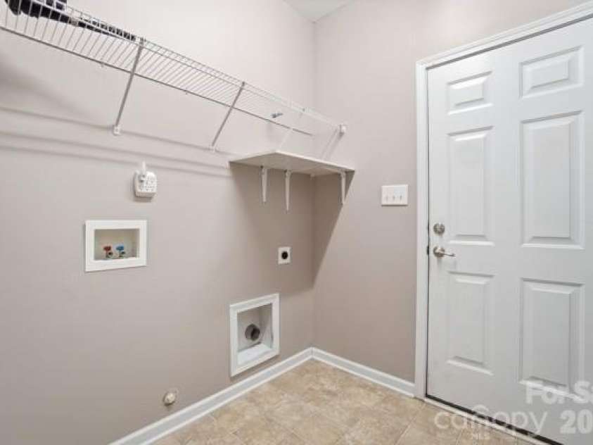 1204 Afternoon Sun Road, Matthews, NC 28104.  MLS# CAR4364140, YatesRealty ID 14517. Spacious Laundry Room