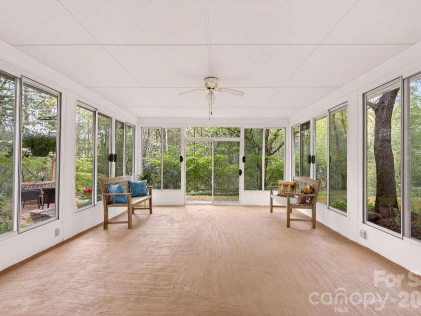 50 Rainbow Ridge Road, Swannanoa, NC 28778.  MLS# CAR4368868, YatesRealty ID 14522. Second Sunroom Looks Out Into Lush Backyard