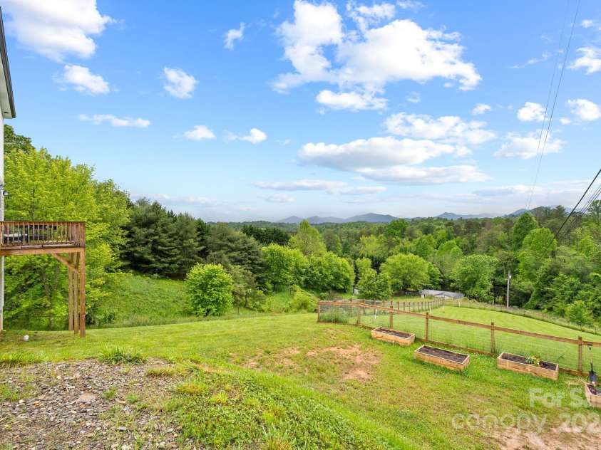 2242 Bear Creek Road, Leicester, NC 28748.  MLS# CAR4260448, YatesRealty ID 14525. 