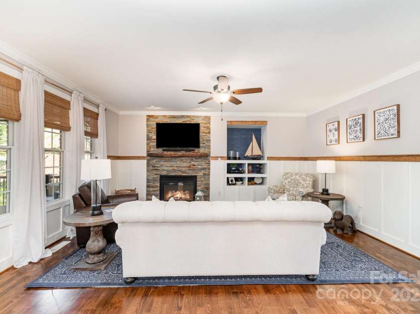 4511 Morning Dove Court, Denver, NC 28037.  MLS# CAR4242342, YatesRealty ID 14527. New stone fireplace with hardwood mantle, new board and batten trim