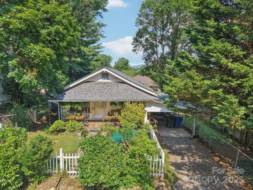68 1/2 Nevada Avenue, Asheville, NC 28806.  MLS# CAR4280825, YatesRealty ID 1453. Slight Mt. Views from back sunroom.  Would have great views if added an upstairs deck or second level. 