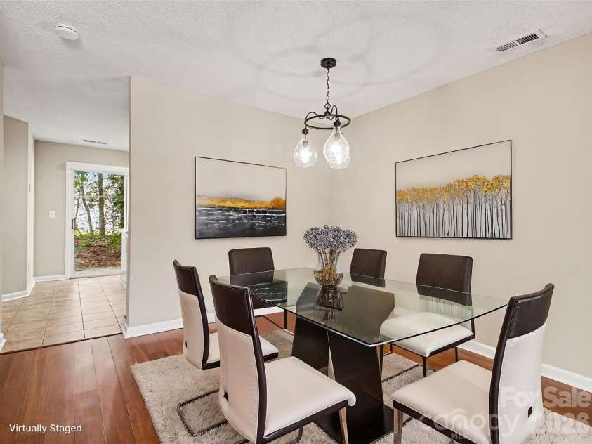 2132 Preakness Court, Charlotte, NC 28273.  MLS# CAR4370965, YatesRealty ID 14533. Dining area virtually staged