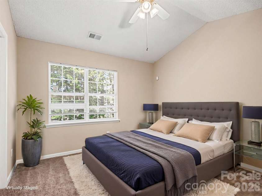 2132 Preakness Court, Charlotte, NC 28273.  MLS# CAR4370965, YatesRealty ID 14533. Spacious primary bedroom virtually  staged