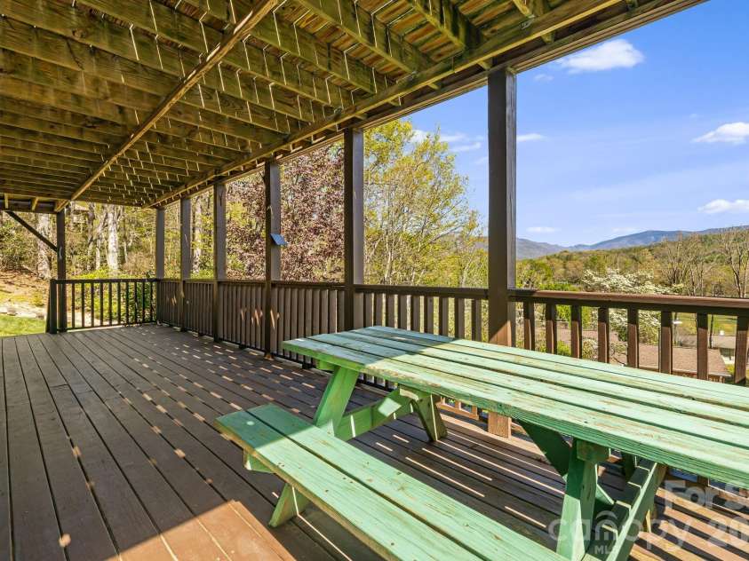 144 Hilltop Road, Black Mountain, NC 28711.  MLS# CAR4368587, YatesRealty ID 14548. Basement level deck