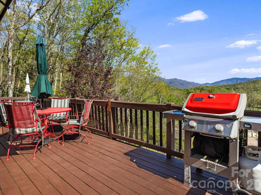 144 Hilltop Road, Black Mountain, NC 28711.  MLS# CAR4368587, YatesRealty ID 14548. Main level deck