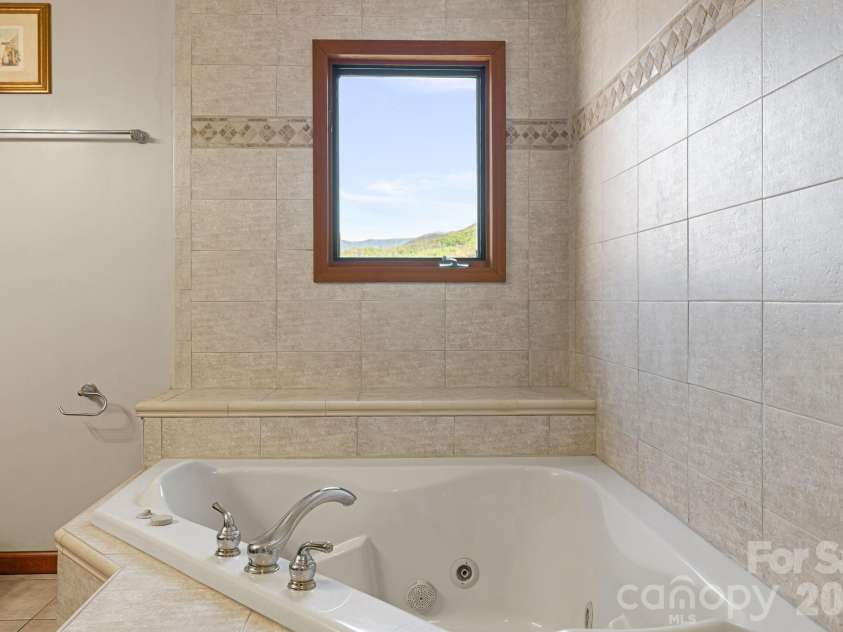 144 Hilltop Road, Black Mountain, NC 28711.  MLS# CAR4368587, YatesRealty ID 14548. Master bathroom