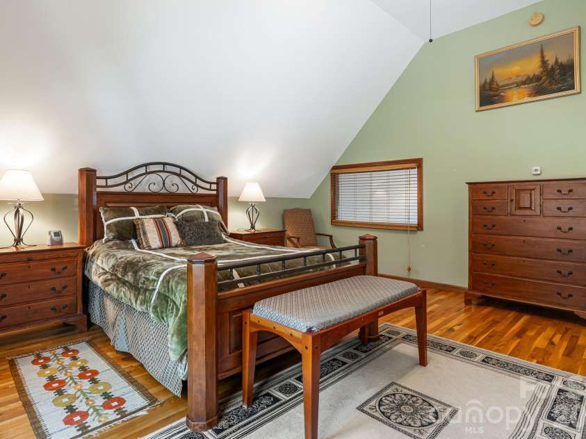 144 Hilltop Road, Black Mountain, NC 28711.  MLS# CAR4368587, YatesRealty ID 14548. Master bedroom