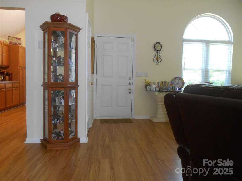 158 Margaret Turner Road, Charlotte, NC 28216.  MLS# CAR4243785, YatesRealty ID 1455. Front door into great room with palladium windows and plenty of natural lighting.