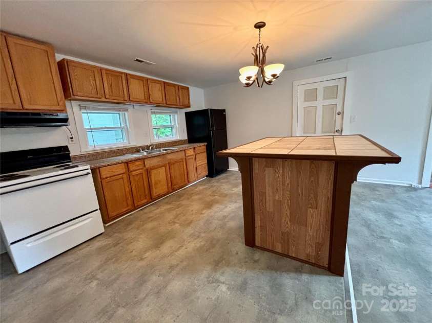 127 Thompson Street, Forest City, NC 28043.  MLS# CAR4260777, YatesRealty ID 14554. 