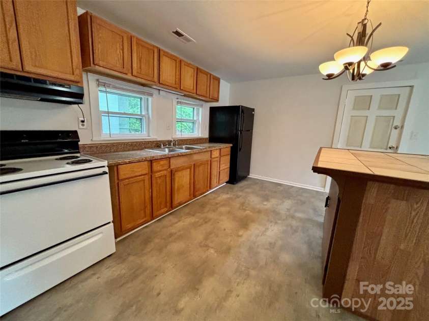 127 Thompson Street, Forest City, NC 28043.  MLS# CAR4260777, YatesRealty ID 14554. 