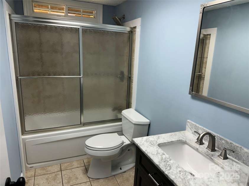 488 John Swofford Road, Nebo, NC 28761.  MLS# CAR4262636, YatesRealty ID 14556. Bathroom 2