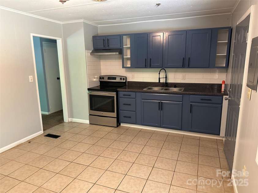 488 John Swofford Road, Nebo, NC 28761.  MLS# CAR4262636, YatesRealty ID 14556. Kitchen / Dining
