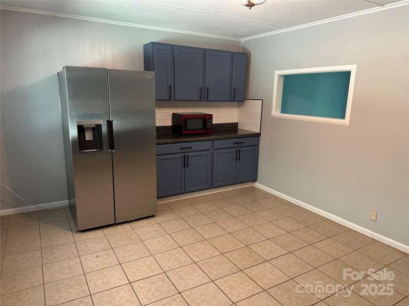 488 John Swofford Road, Nebo, NC 28761.  MLS# CAR4262636, YatesRealty ID 14556. Kitchen / Dining