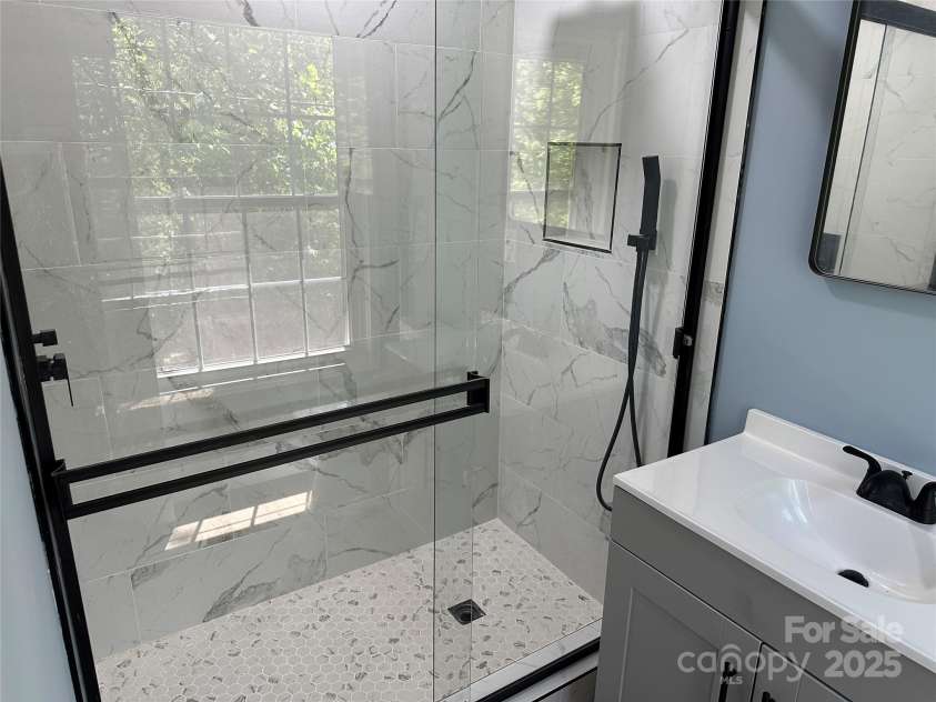 488 John Swofford Road, Nebo, NC 28761.  MLS# CAR4262636, YatesRealty ID 14556. Primary Bath
