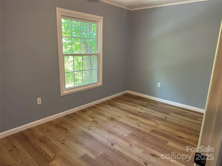 488 John Swofford Road, Nebo, NC 28761.  MLS# CAR4262636, YatesRealty ID 14556. Primary Bedroom
