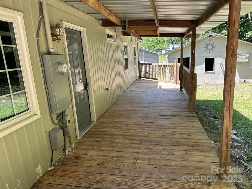 488 John Swofford Road, Nebo, NC 28761.  MLS# CAR4262636, YatesRealty ID 14556. Rear Covered Deck