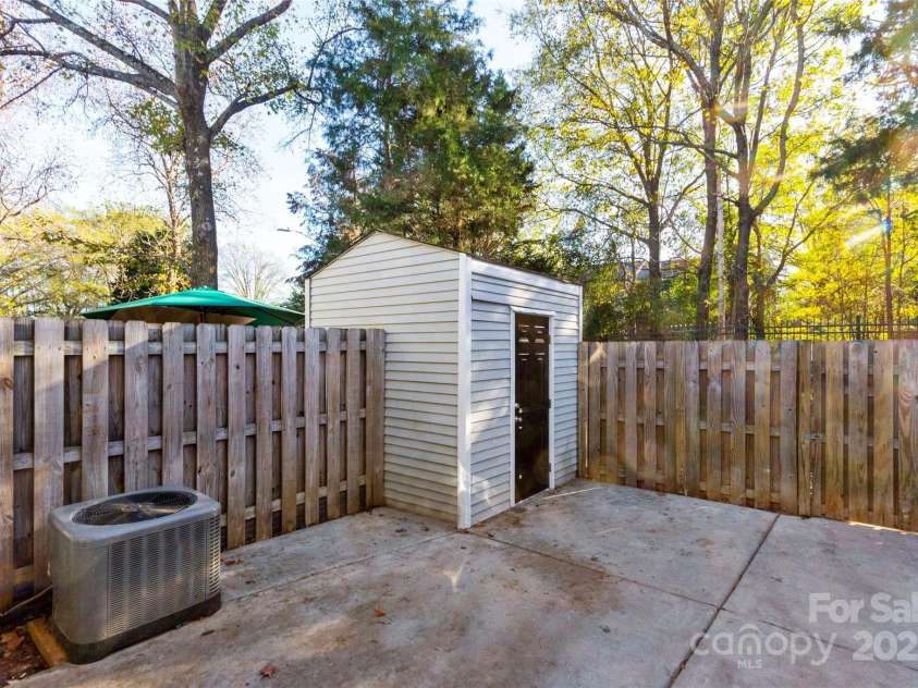 9464 Lexington Circle, Charlotte, NC 28213.  MLS# CAR4260506, YatesRealty ID 14557. Back Patio and Storage Building