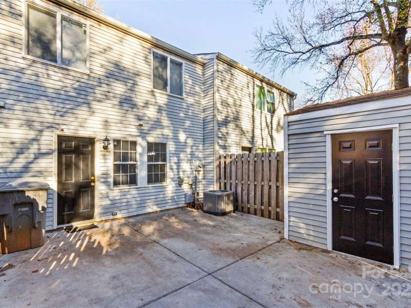 9464 Lexington Circle, Charlotte, NC 28213.  MLS# CAR4260506, YatesRealty ID 14557. Back Patio and Storage Building
