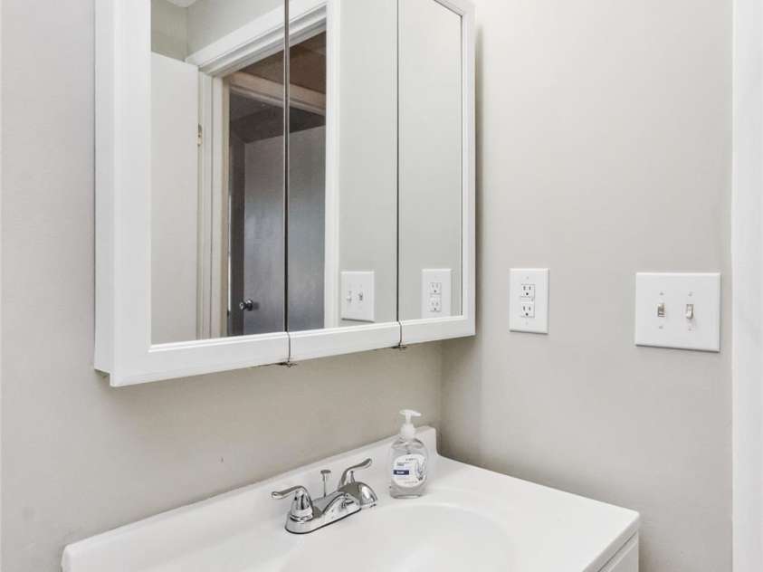 9464 Lexington Circle, Charlotte, NC 28213.  MLS# CAR4260506, YatesRealty ID 14557. Hall Bathroom Vanity