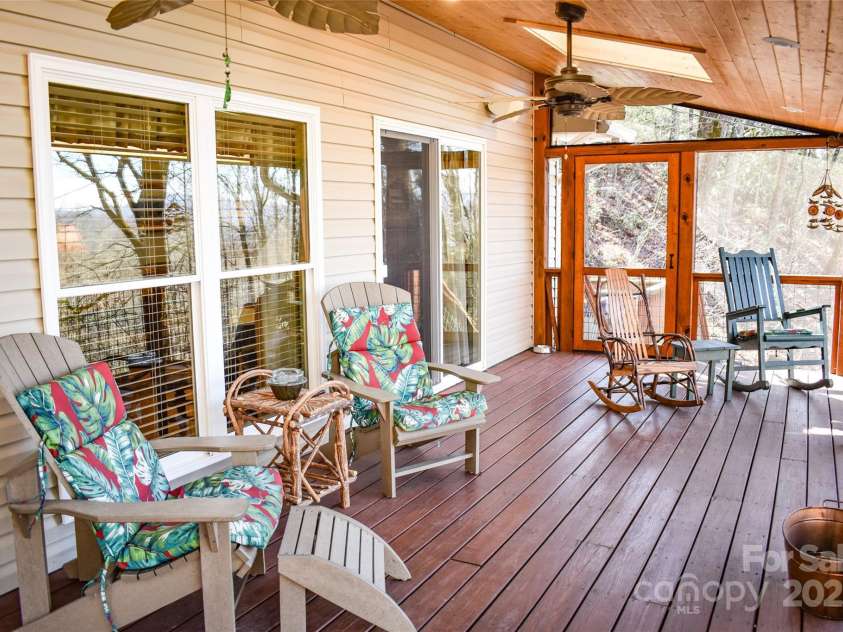 12 Bear Cove Lane, Bryson City, NC 28713.  MLS# CAR4220590, YatesRealty ID 1456. Large Screened inporch.