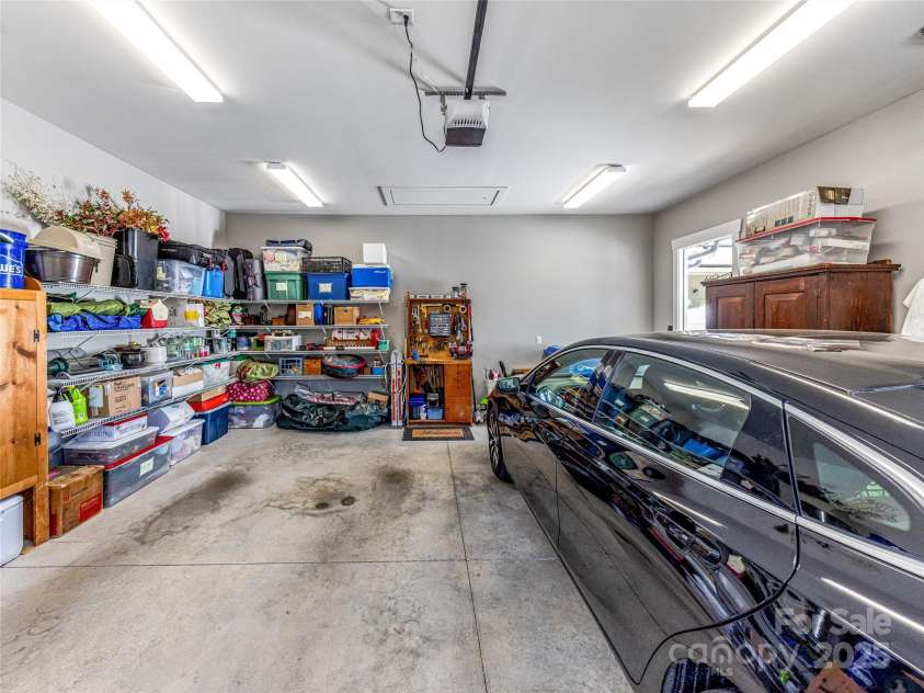 294 Main Street, Brevard, NC 28712.  MLS# CAR4260783, YatesRealty ID 14562. 2 car garage, around the back of the home via a private driveway
