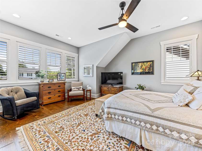 294 Main Street, Brevard, NC 28712.  MLS# CAR4260783, YatesRealty ID 14562. Big, bright and beautiful bedroom with a full wall of windows