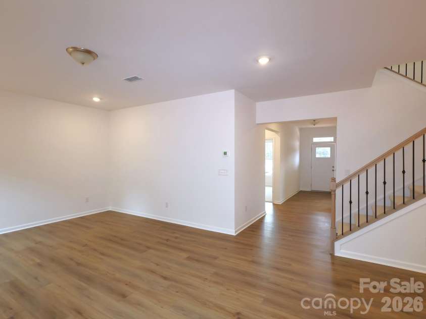 225 Amber Glen Drive, Locust, NC 28097.  MLS# CAR4373458, YatesRealty ID 14565. Family room