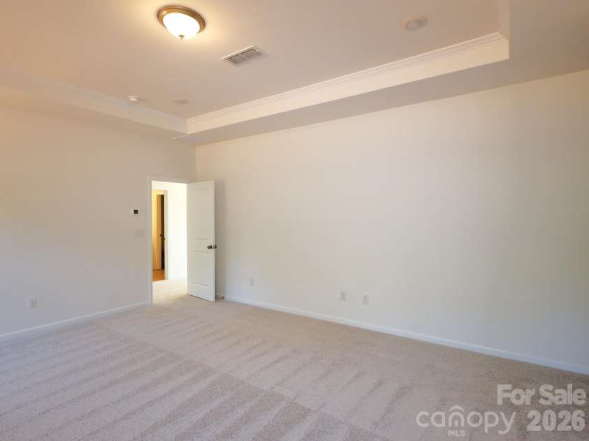 225 Amber Glen Drive, Locust, NC 28097.  MLS# CAR4373458, YatesRealty ID 14565. Owner's suite