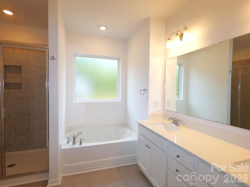 225 Amber Glen Drive, Locust, NC 28097.  MLS# CAR4373458, YatesRealty ID 14565. Owner's suite
