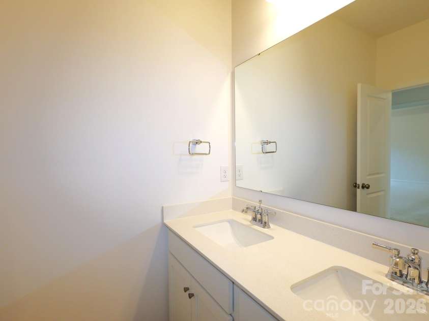 225 Amber Glen Drive, Locust, NC 28097.  MLS# CAR4373458, YatesRealty ID 14565. Secondary bathroom