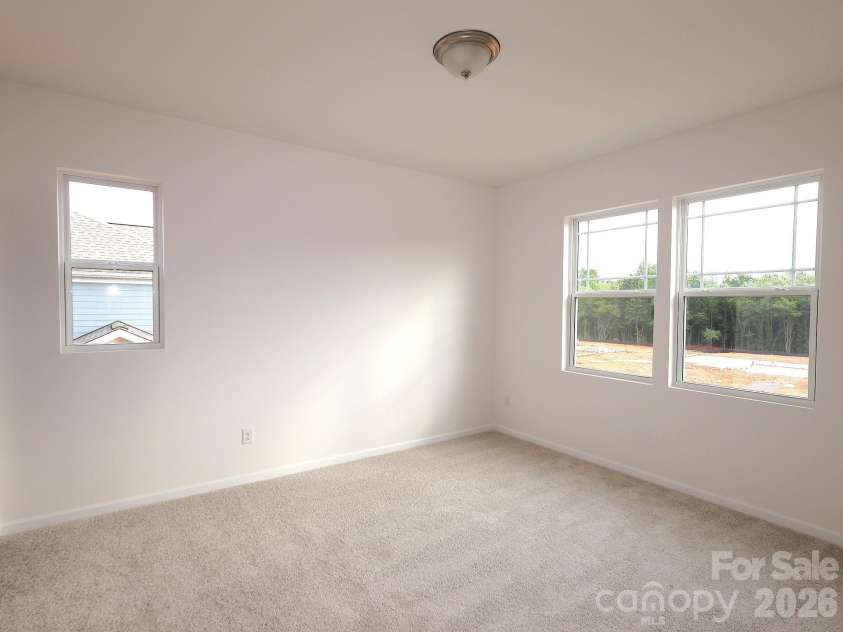 225 Amber Glen Drive, Locust, NC 28097.  MLS# CAR4373458, YatesRealty ID 14565. Secondary bedroom