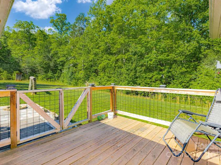 635 Worley Road, Marion, NC 28752.  MLS# CAR4209709, YatesRealty ID 1457. Back Deck overlooking flat back yard