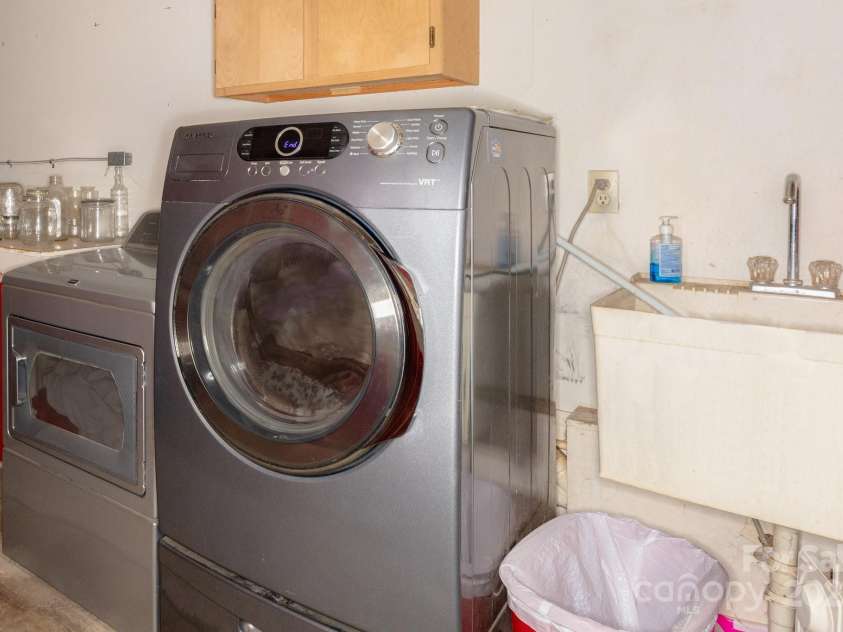 635 Worley Road, Marion, NC 28752.  MLS# CAR4209709, YatesRealty ID 1457. Laundry area in back of garage space. Separated by wall