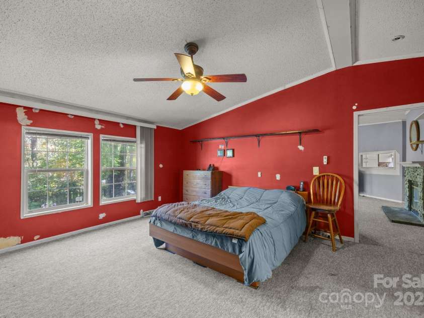 74 Davis Chapel Road, Candler, NC 28715.  MLS# CAR4311937, YatesRealty ID 1457. Huge primary bedroom
