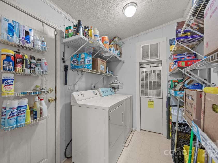74 Davis Chapel Road, Candler, NC 28715.  MLS# CAR4311937, YatesRealty ID 1457. Utility/laundry room